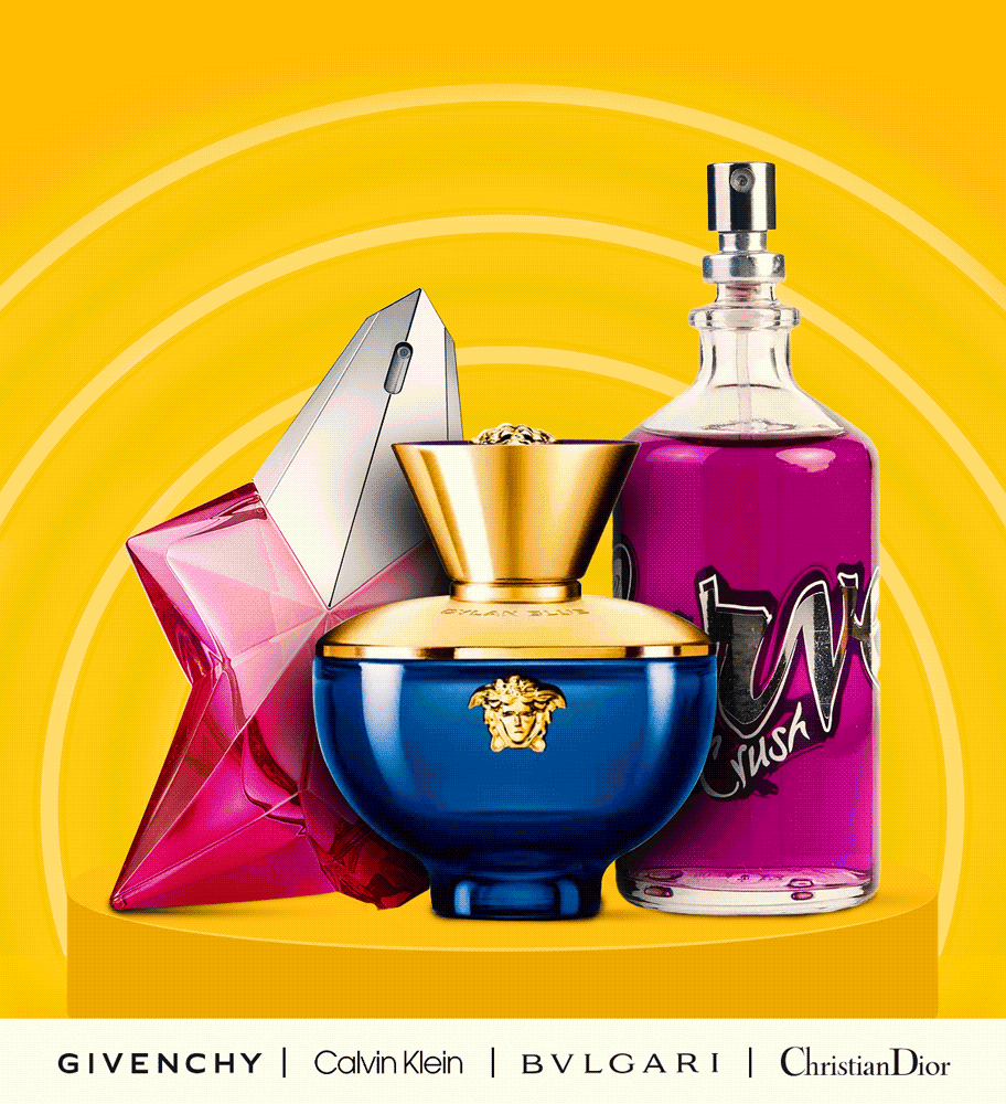 Neon lights advertise a summer display for popular perfumes and colognes